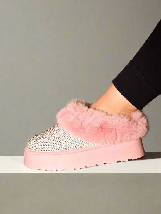 The Embellished Faux Fur Platform Booties are a perfect blend of style and comfort. 