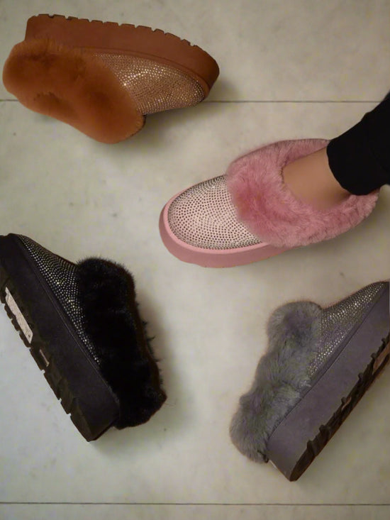 The Embellished Faux Fur Platform Booties are a perfect blend of style and comfort. 