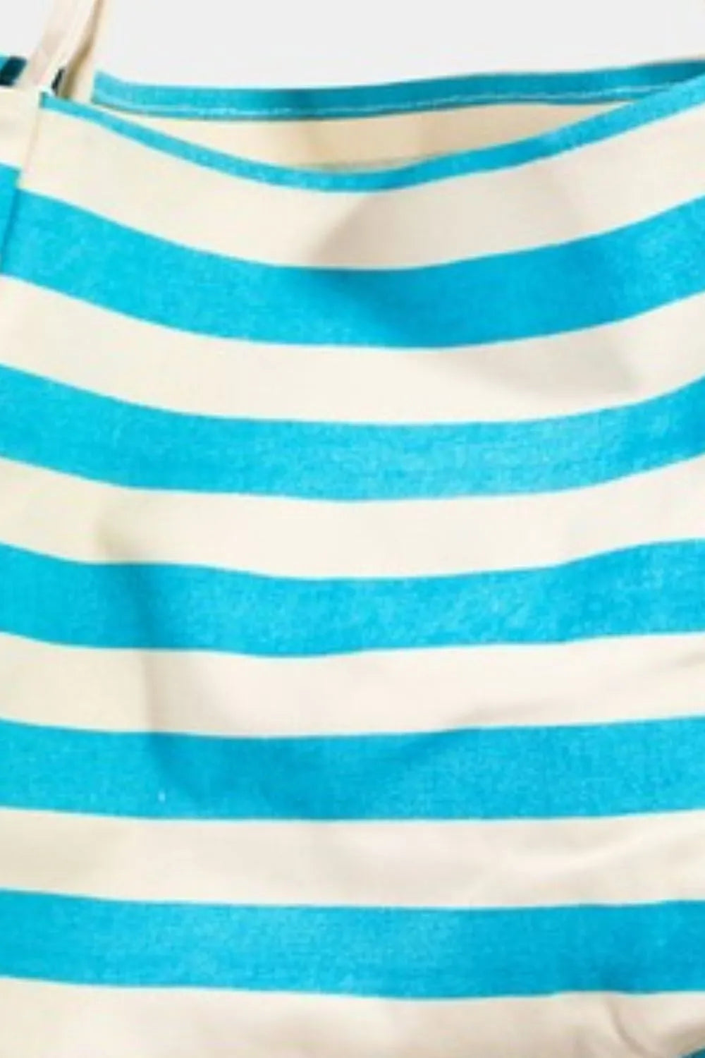 This bright color stripe tote bag is a fun and vibrant accessory perfect for adding a pop of color to any outfit.