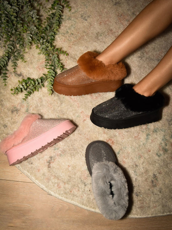 The Embellished Faux Fur Platform Booties are a perfect blend of style and comfort. 