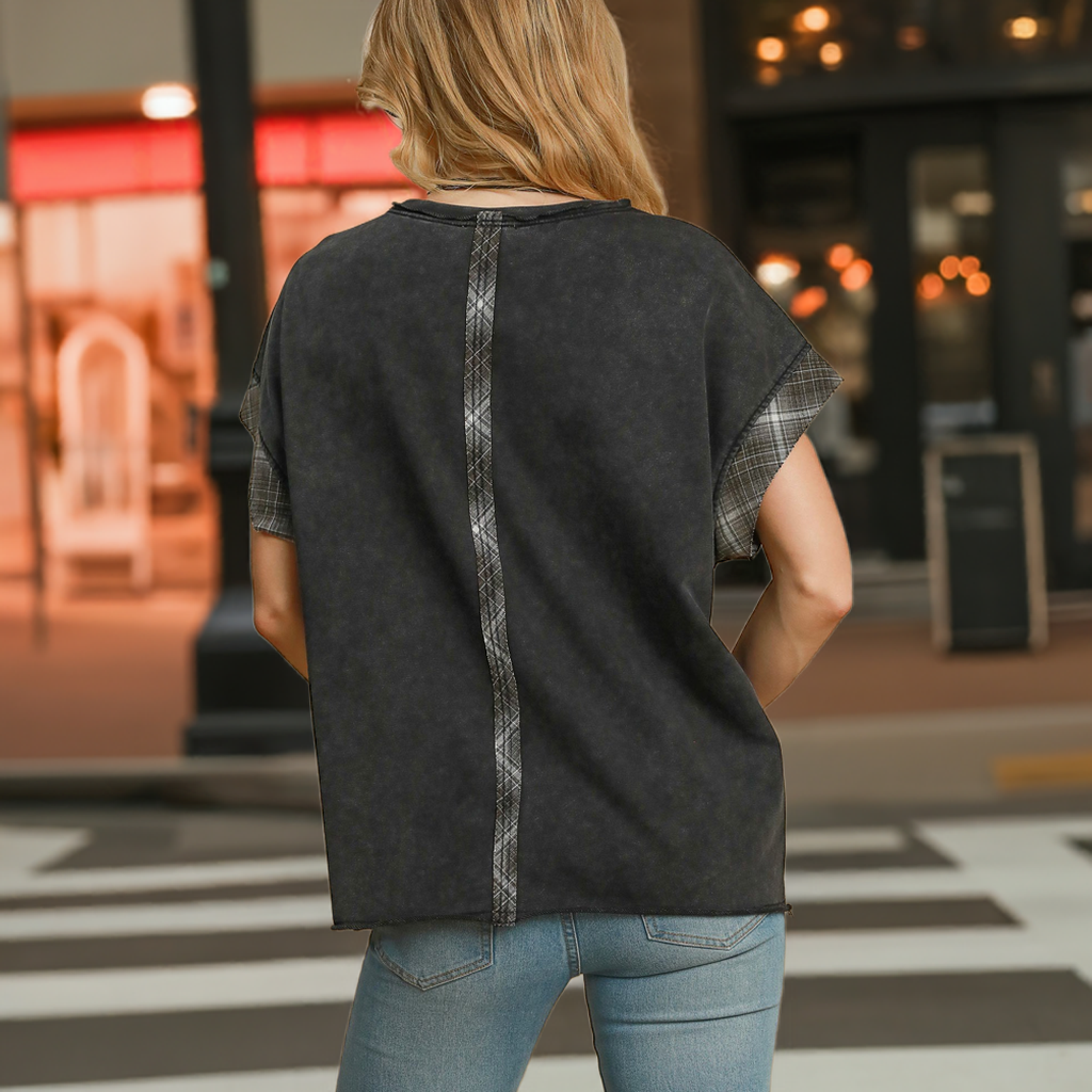 The Peace Applique Round Neck French Terry Top is a casual and cozy piece perfect for everyday wear. The peace sign applique adds a playful and positive touch to the classic design. 