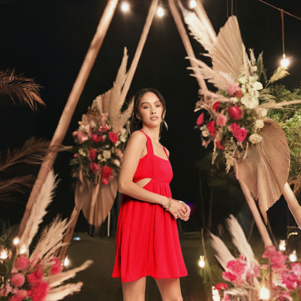 The washed satin cutout skirt bandeau red mini dress is a luxurious and stylish choice for a special occasion. 