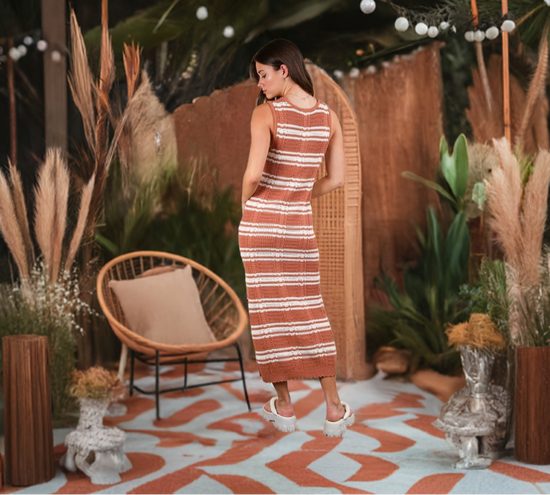 The Stripe Knit Casual Sweater Midi Dress is a cozy and stylish option for a laid-back and chic look. 