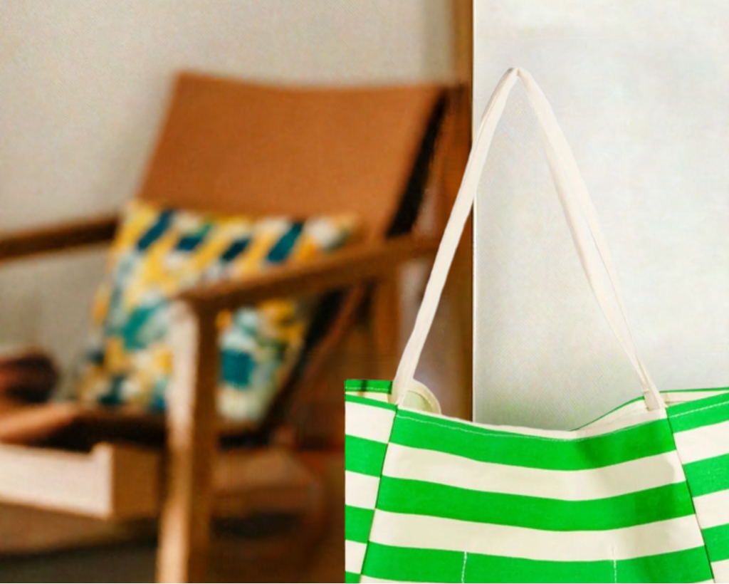 A bright color stripe tote bag is a vibrant and eye-catching accessory featuring colorful stripes. 