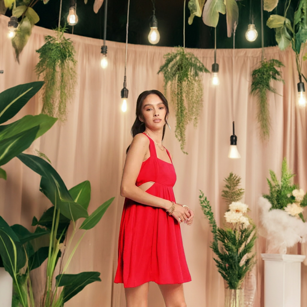 The washed satin cutout skirt bandeau red mini dress is a luxurious and stylish choice for a special occasion. 