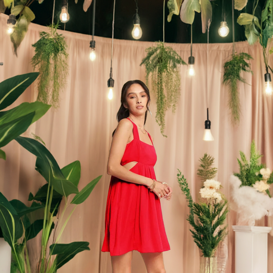 The washed satin cutout skirt bandeau red mini dress is a luxurious and stylish choice for a special occasion. 